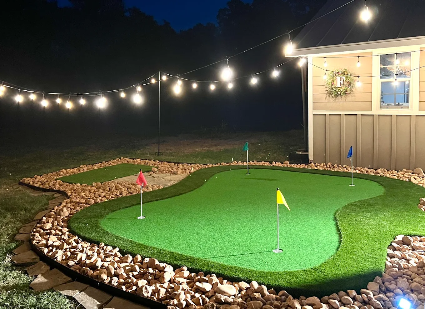 Restored synthetic turf area after professional repair and re-infill