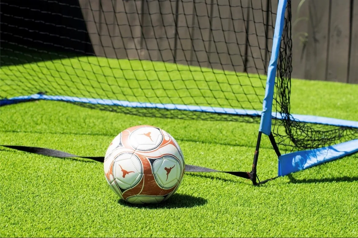 Sports and play surface synthetic turf with soccer markings